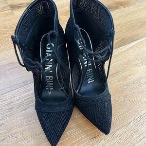Gianni Bini black lace up heels. New, never been worn. Size 5.5